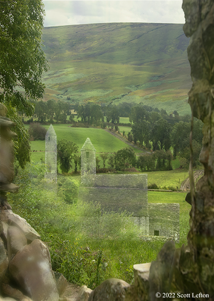 A ghostly stone house sits in a beautiful green landscape.