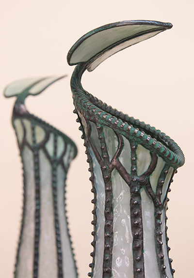 Details of the glass and metal lampshades